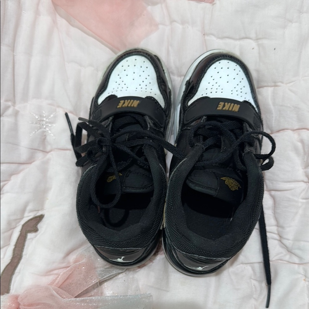 Nike Black and White Shoes with Gold Details